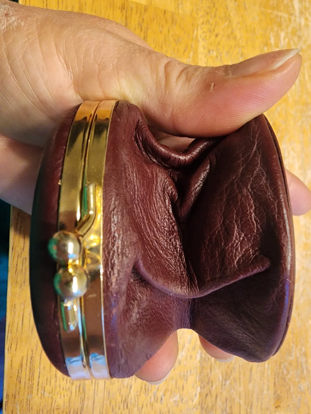 vintage Christian Dior maroon leather kiss-lock coin purse embossed Logo